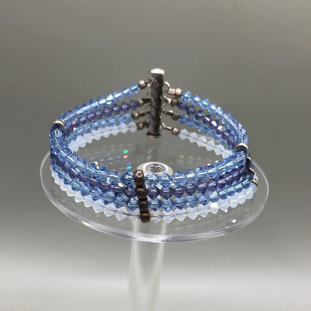 Dazzling shades of blue crystals 4 row bracelet sterling silver 925 dressy